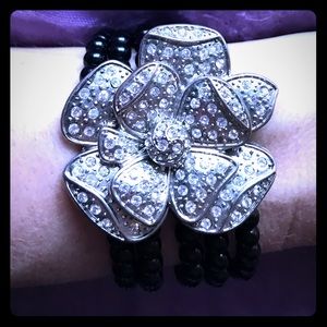 Arden B flower bracelet on black beaded strands